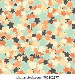 A motley pattern of five-pointed stars with rounded corners. Seamless texture. Autumn colors.