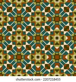 Motley polygonal seamless pattern in warm colors. Overlapping art forms, stripes, polygons, segments are grouped and arranged in a certain order. Vector. 
