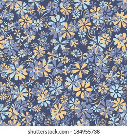 Motley seamless background with a pattern of a variety of small flowers for spring or summer design