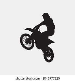 Motocross driver jump silhouette