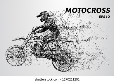 Motocross particles. A motorcyclist performs stunts.