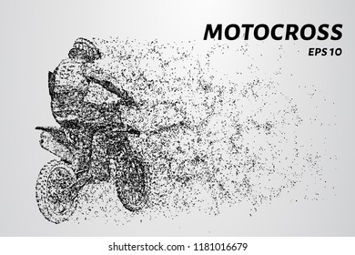 Motocross particles. A motorcyclist performs stunts.