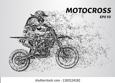 Motocross particles. A motorcyclist performs stunts.