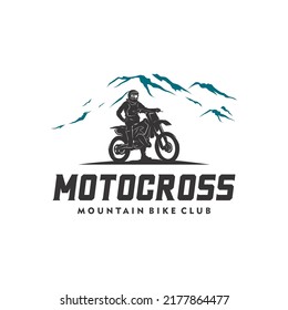 Motocross silhouette in the mountain logo design template