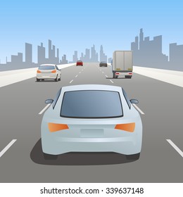 motor vehicles driving on urban highway