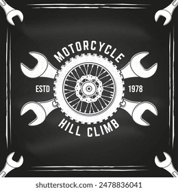 Motorcycle hill climb logo, badge, sticker on the chalkboard. Vector illustration. Extreme sport with motorcycle wheel and wrenches. Monochrome style motorcycle wheel and wrenches