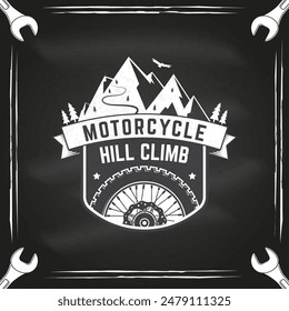 Motorcycle hill climb logo, badge, sticker on the chalkboard. Vector. Extreme sport with motorcycle wheel and mountains. Monochrome style motorcycle wheel with mountains