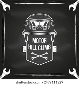 Motorcycle hill climb logo, badge, sticker on the chalkboard. Vector illustration. Extreme sport with motorcycle helmet, glasses and wrenches. Monochrome style