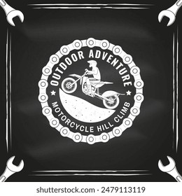 Motorcycle hill climb logo, badge, sticker on the chalkboard. Vector. Extreme sport with motorbike for extreme jump and race in mountains. Monochrome style man riding in helmet on a motorcycle