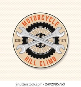 Motorcycle hill climb logo, badge, sticker. Vector. Extreme sport with motorcycle wheel and wrenches.