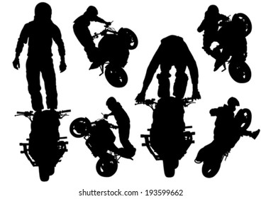 Motorcyclist performed extreme stunts on a white background