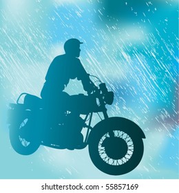 Motorcyclist In The Rain