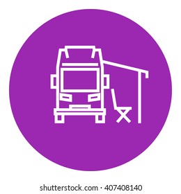 Motorhome with tent line icon.