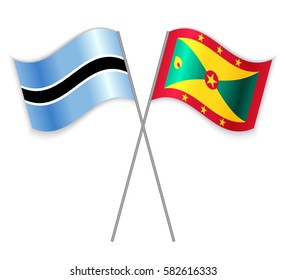 Motswana and Grenadian crossed flags. Botswana combined with Grenada isolated on white. Language learning, international business or travel concept.