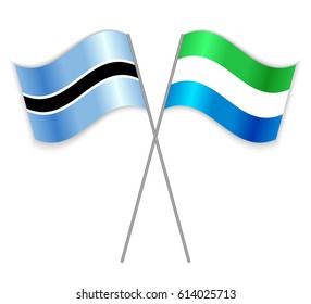 Motswana and Sierra Leonean crossed flags. Botswana combined with Sierra Leone isolated on white. Language learning, international business or travel concept.