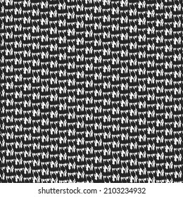 Tejidos con un patrón de formas o signos en blanco y negro. Algodón de punto o manta de lana.