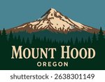 Mount Hood stands majestically surrounded by dense forests, creating a serene and picturesque landscape perfect for outdoor exploration in Oregon.