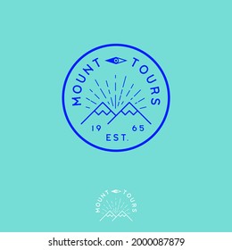 Mount tours logo. Extreme sport emblem like stamp. Ice peaks and sunrise into circle badge. Emblem for sport, alpinism, sport equipment and clothing mark.