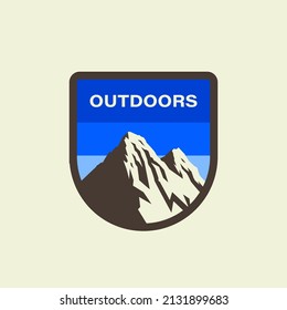 Mountain badge logo. Vector hill emblem on the blue background. Isolated Retro patch Design  