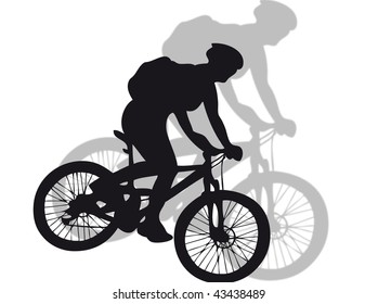 Mountain bike silhouette with shadow on the background