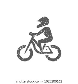 Mountain biker icon in grunge texture. Vintage style vector illustration.