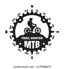 Biker de montaña, logotipo en forma de brújula.