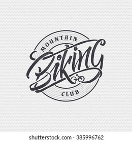 Mountain biking sign  handmade differences, made using calligraphy and lettering It can be used as insignia badge logo design cycling sports club