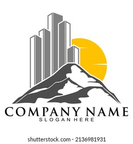 Mountain building and sun vector logo