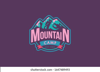 Mountain camp vector logo template. Rocks illustration with typography. Mountaineering retro badge