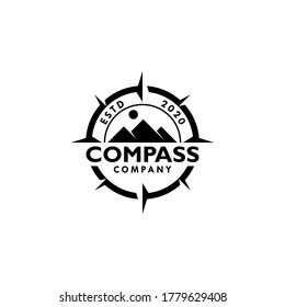 Mountain and compass logo vector. Adventure or outdoor symbol design illustration