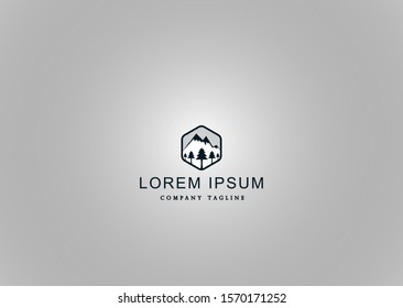
mountain emblem logo with a tree inside a polygon object