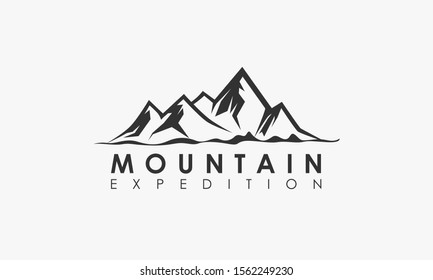 Mountain expedition adventure logo with mountain shape. Emblem sign symbol for club, community, climber,
and extreme sport. Vector illustration.