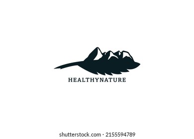Mountain feather vector logo design. Leaf with mountain logo design icon.