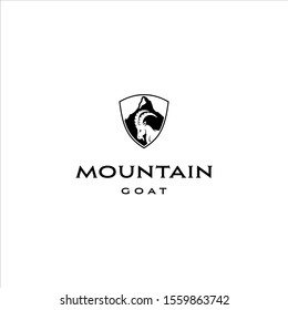 Mountain goat badge along with a mountain background