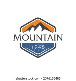 mountain in hexagon template logo. flat style trend vintage simple hiking logotype graphic art design isolated on white background. concept of climbing park sticker or survival camping banner element