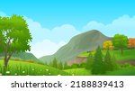Mountain and hillside view with lush trees and grass