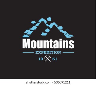 Mountain icon design with clouds on black background. Vector illustration. 