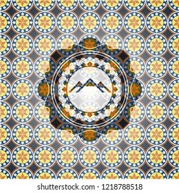 mountain icon inside arabesque style badge. arabic decoration.