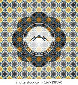 mountain icon inside arabesque style badge. arabic decoration.