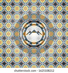 mountain icon inside arabic badge. Arabesque decoration.