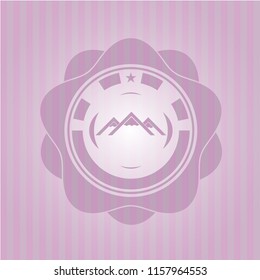 mountain icon inside badge with pink background