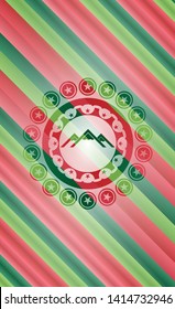 mountain icon inside christmas badge.