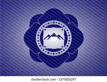 mountain icon inside emblem with jean high quality background