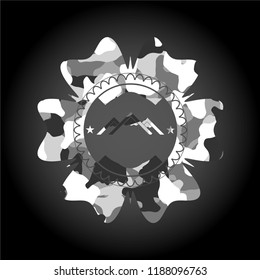 mountain icon inside grey camo texture