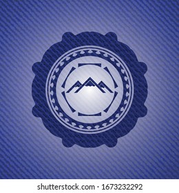 icono de montaña dentro del fondo del jean