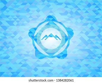 mountain icon inside light blue emblem. Mosaic background