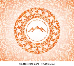 mountain icon inside orange mosaic emblem with background