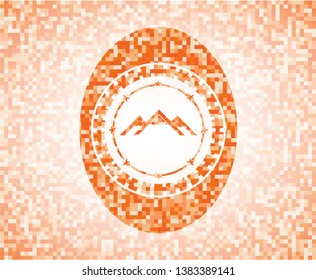mountain icon inside orange mosaic emblem