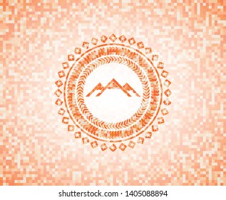 mountain icon inside orange mosaic emblem with background