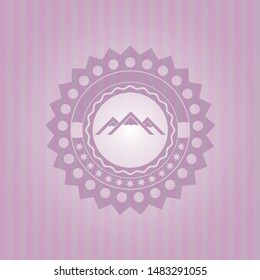 mountain icon inside pink emblem
